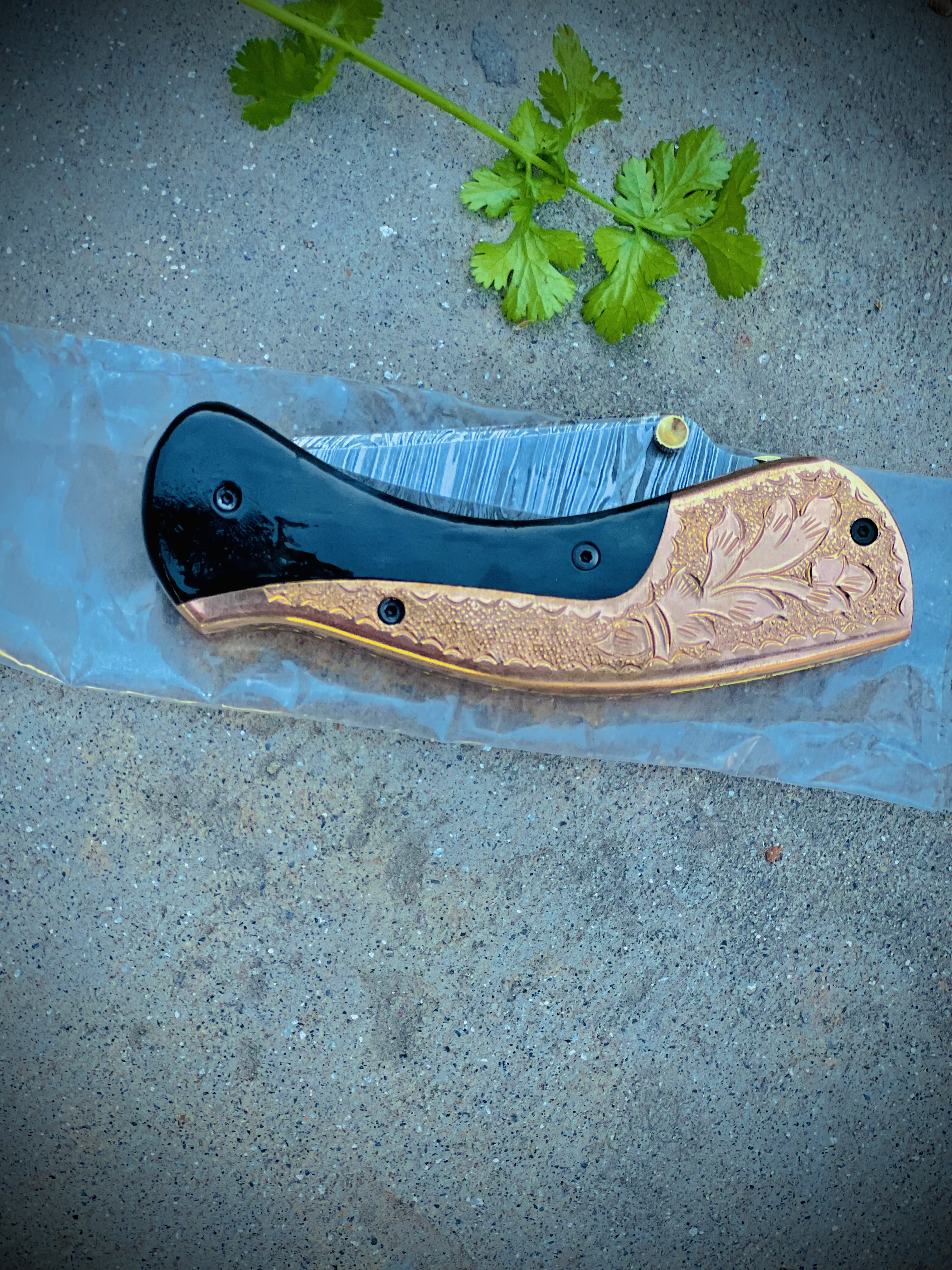Luxury Damascus Pocket Knife - Black Horn & Copper - Hand Engraved Bolster